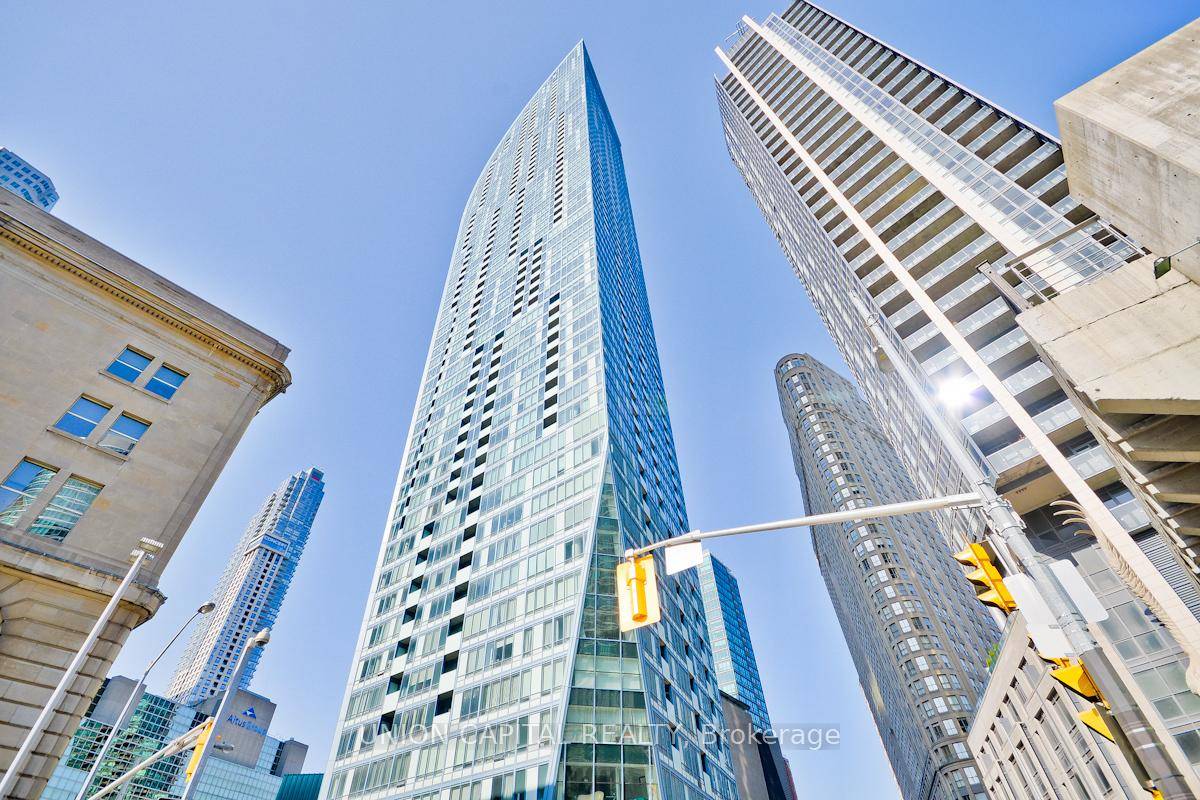 Welcome to the iconic L Tower at 8 The Esplanade, where luxury meets location in the heart of downtown Toronto !