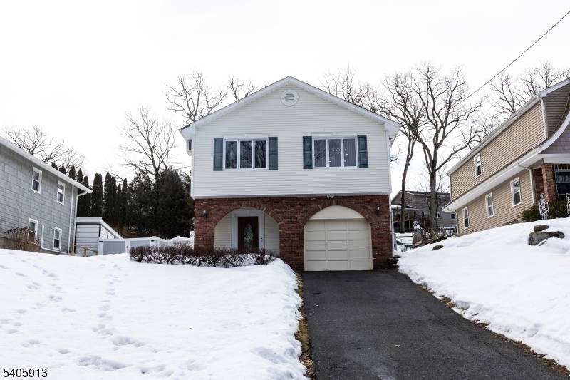 Welcome home to this beautifully, move in ready updated 4 bedroom 3 full bath mother daughter style home in the desirable Short Hills section of Mount Arlington township.