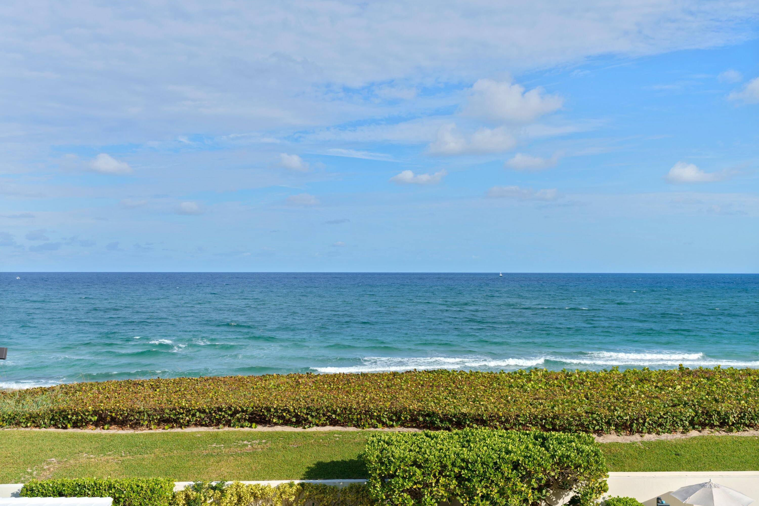 Spectacular Direct Oceanfront views with lovely cream and white decor, updated eat in kitchen updated bathrooms.