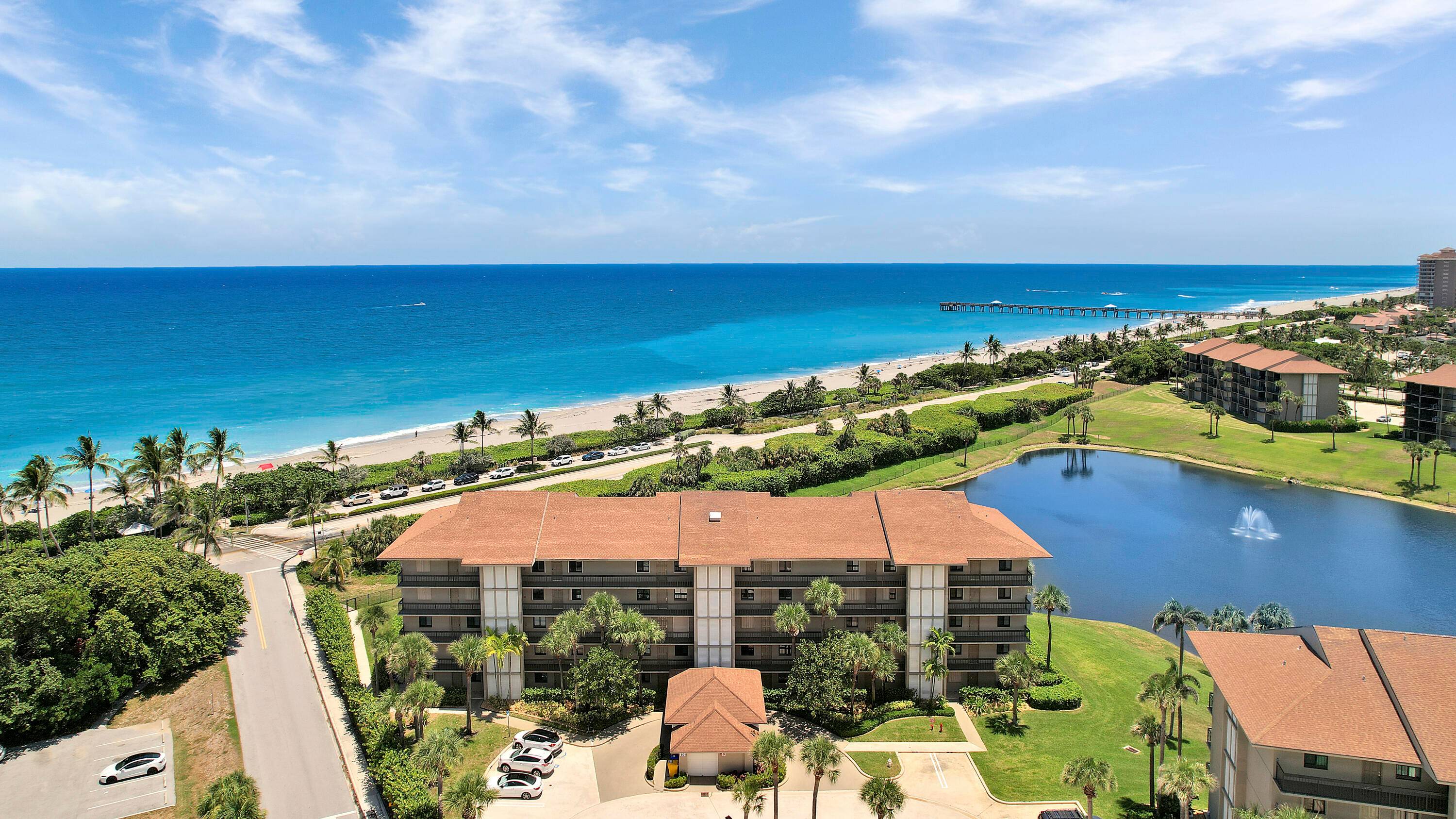 Experience coastal living at its finest in this stunning, fully furnished, turnkey 2 bedroom, 2 bath oceanfront condo in 'Ocean at The Bluffs South' on Jupiter Beach.