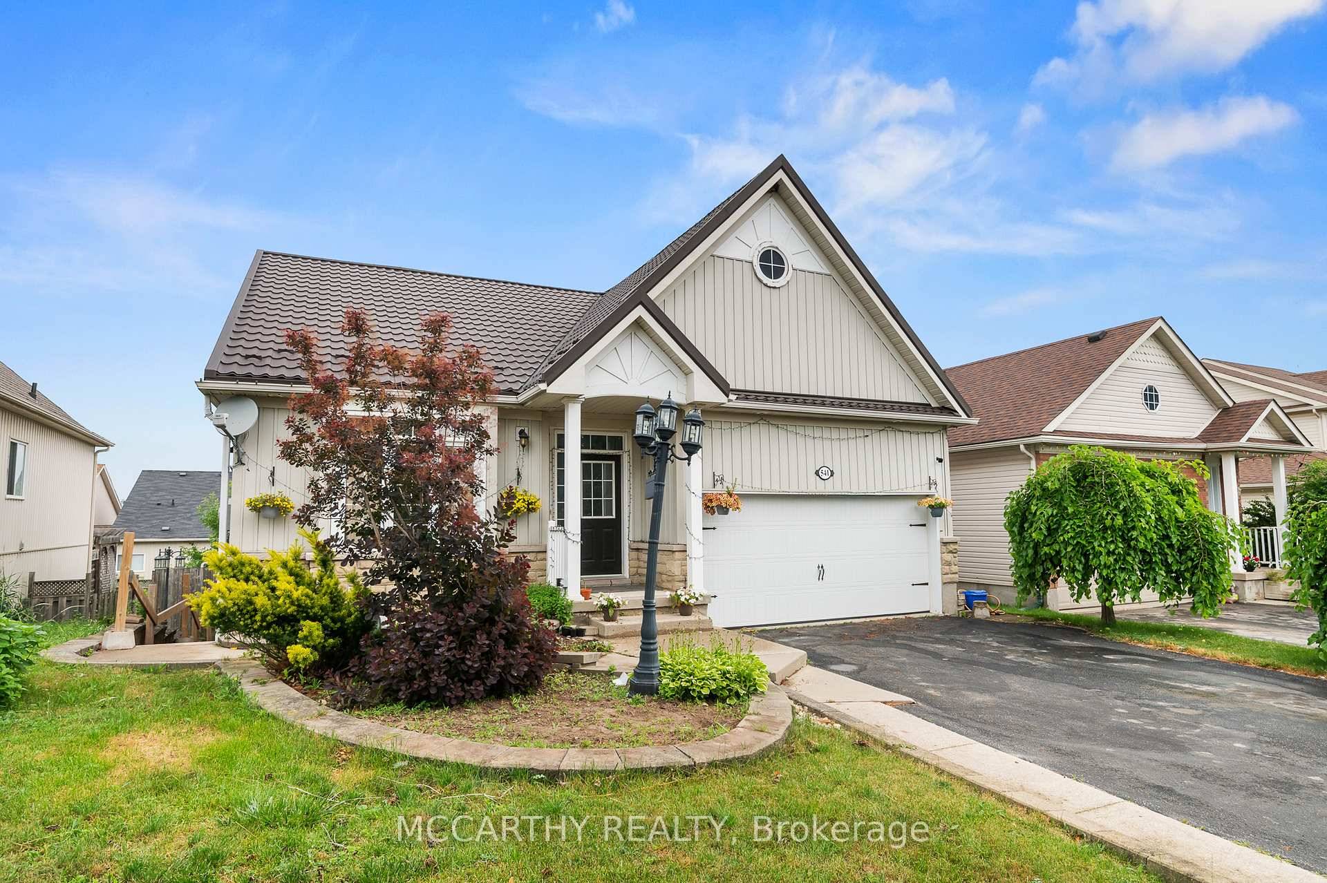Welcome to this Beautiful Bungalow offering 3 spacious bedrooms on the main level PLUS 2 additional bedrooms in the fully finished walk out basement !