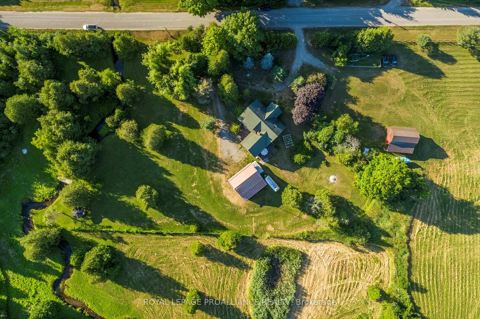 Nestled just minutes from Hwy 401 amp ; the charming village of Grafton, this self sufficient 9 acre property features a custom square log home offering 3, 500 sq.