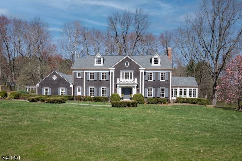 Stunningly remodeled in 2025 26, a gated Harding residence showcases an abundance of high end materials, finishes and updates.