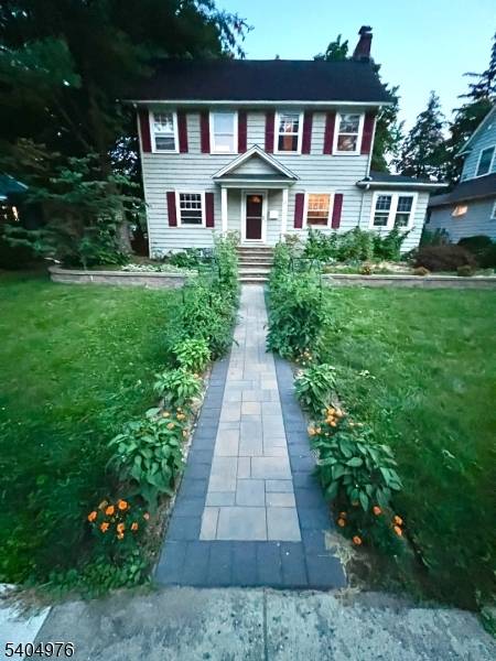 Sunny Upper Montclair Center Hall Colonial on quiet side street close to Brookdale park, Watchung Plaza, shopping, restaurants, NYC trains and buses.