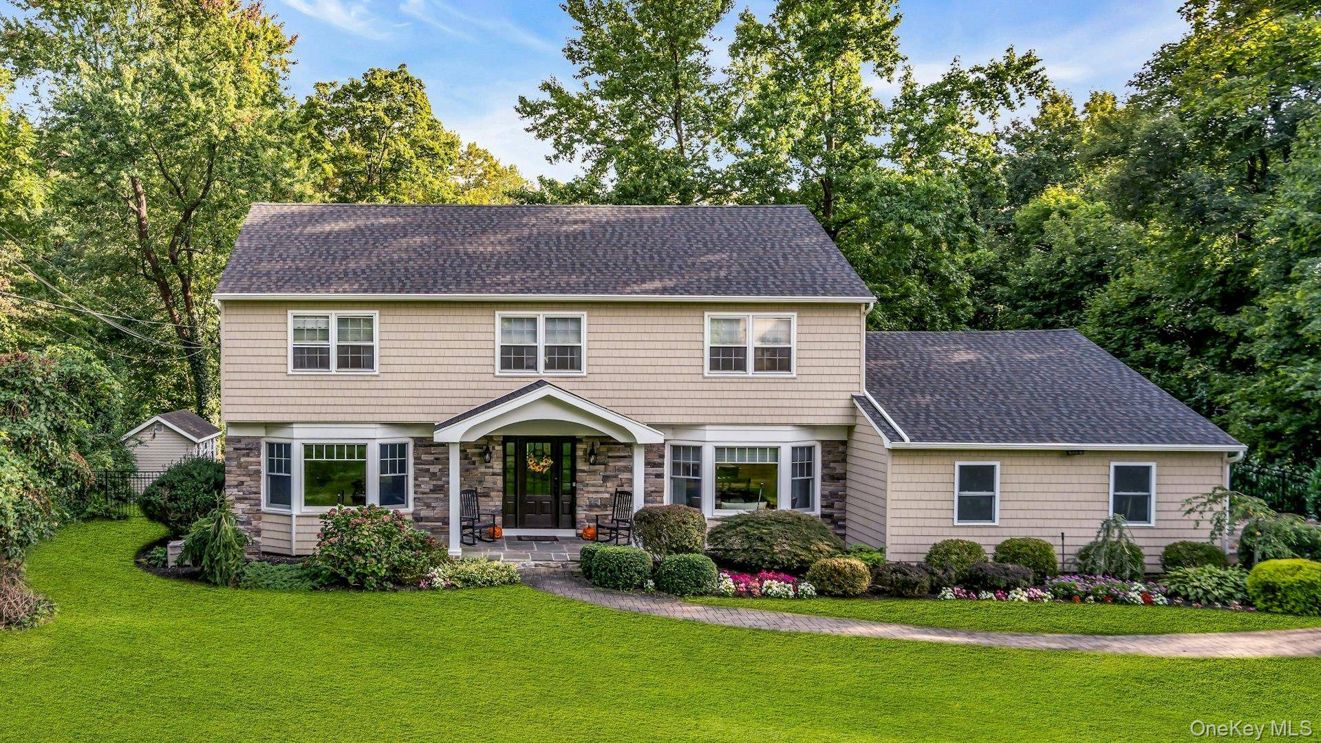 Welcome to 18 Norma Lane, Dix Hills.