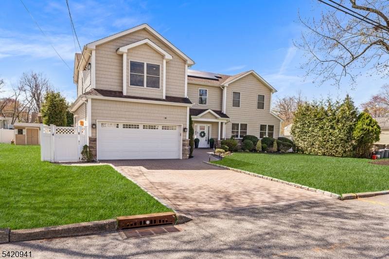 Welcome to this beautifully updated Custom Center Hall Colonial nestled in a desirable residential neighborhood in Emerson, NJ.