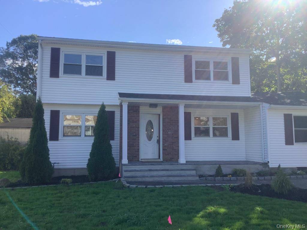 Welcome to 31 Colony Rd A Turnkey Gem in the Heart of Port Jefferson Station !
