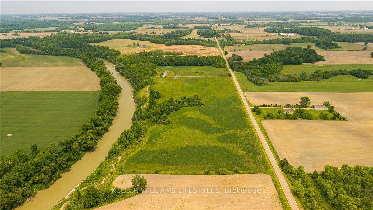 Escape to the country with this breathtaking 40 acre riverfront property.