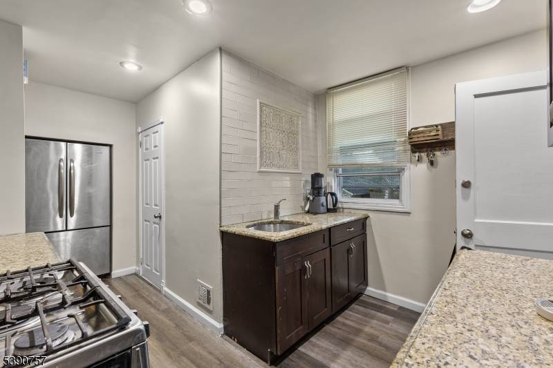Welcome Home ! Discover this beautifully maintained two family home ideally located near the Maplewood border.