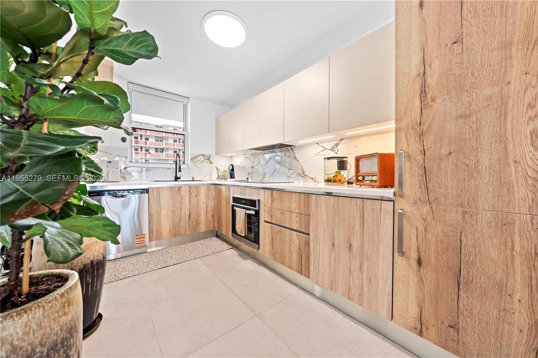 SOPHISTICATED WATERFRONT LIVING IN GATED EASTERN SHORES.