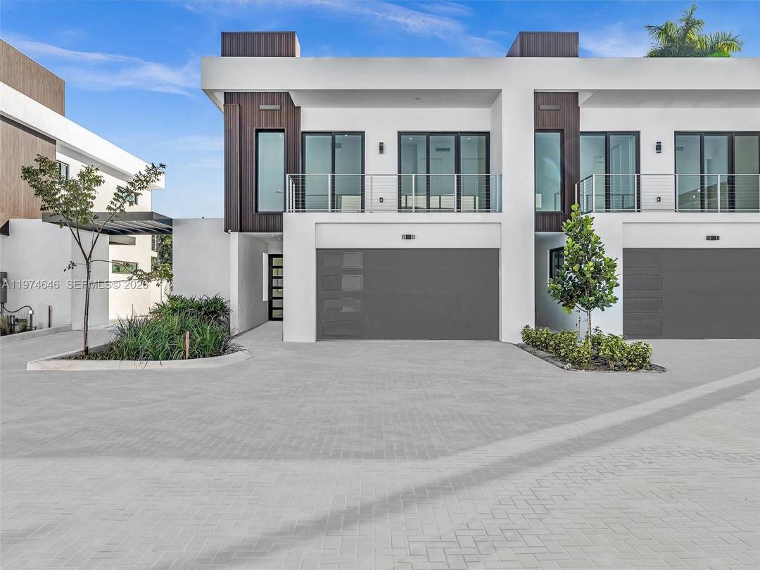 MOVE IN READY ! Introducing H2O Dania, a newly delivered, gated townhome community in Dania Beach featuring just 11 modern residences with starting prices from 990, 000.