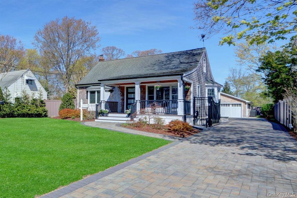This recently renovated two bedroom, two bathroom cottage in desirable South Bayport, NY, is the epitome of modern living combined with classic charm.