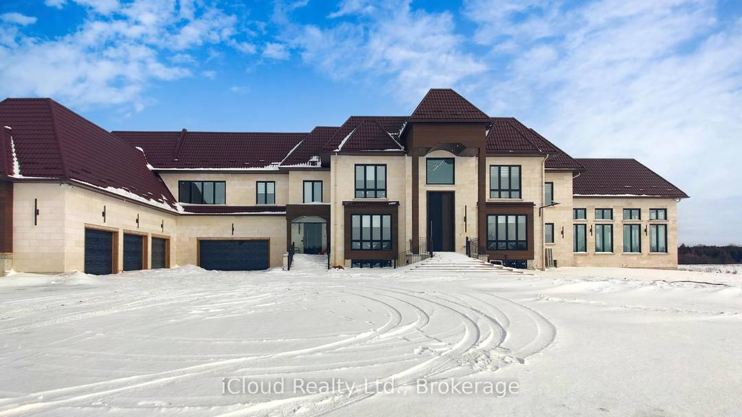 Custom built estate on 23 pristine, flat acres in the heart of Mono offering over 8, 600 sq ft of luxurious living space and less than one year old.