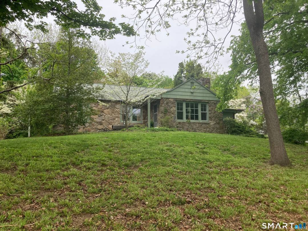 Rare opportunity to live on one of the most coveted streets in the Fairfield University area, and on one of the largest parcels.