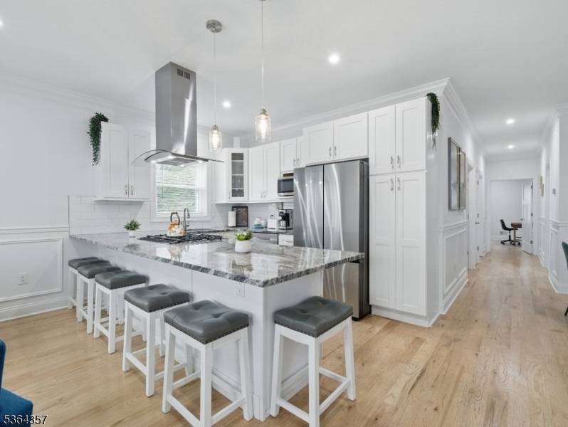 Modern Multi Family Home with Luxury Features in Elizabeth Exceptional opportunity to own a two year old beautifully designed multi family home built in the heart of Elizabeth.