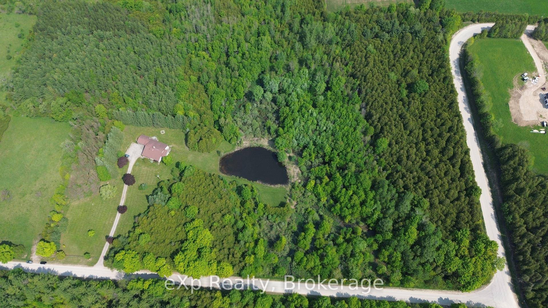 Welcome to this impressive, custom built home, privately nestled on 22 acres and set well back from the road.