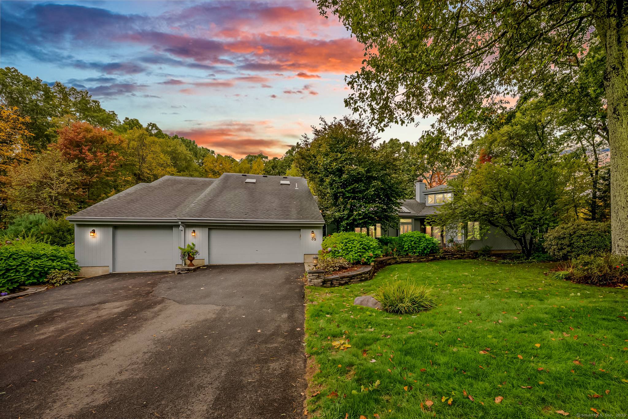 RARELY available is this 5 bed, 4 full 2 half bath contemporary style home tucked away on PICTURESQUE High Ridge Hollow in HIGHLY SOUGHT AFTER West Avon.