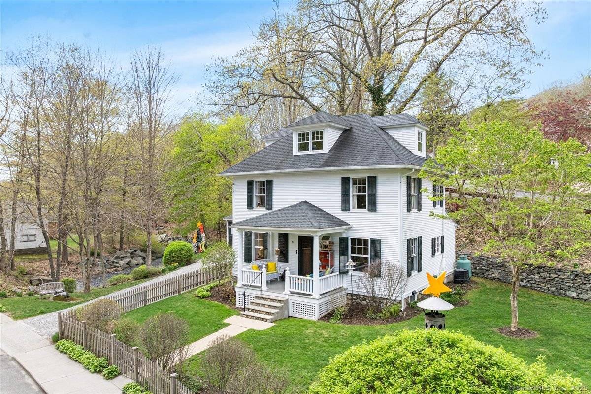 Fantastic home in wonderful private setting with views of Chester Creek and sounds of the waterfall across the street.