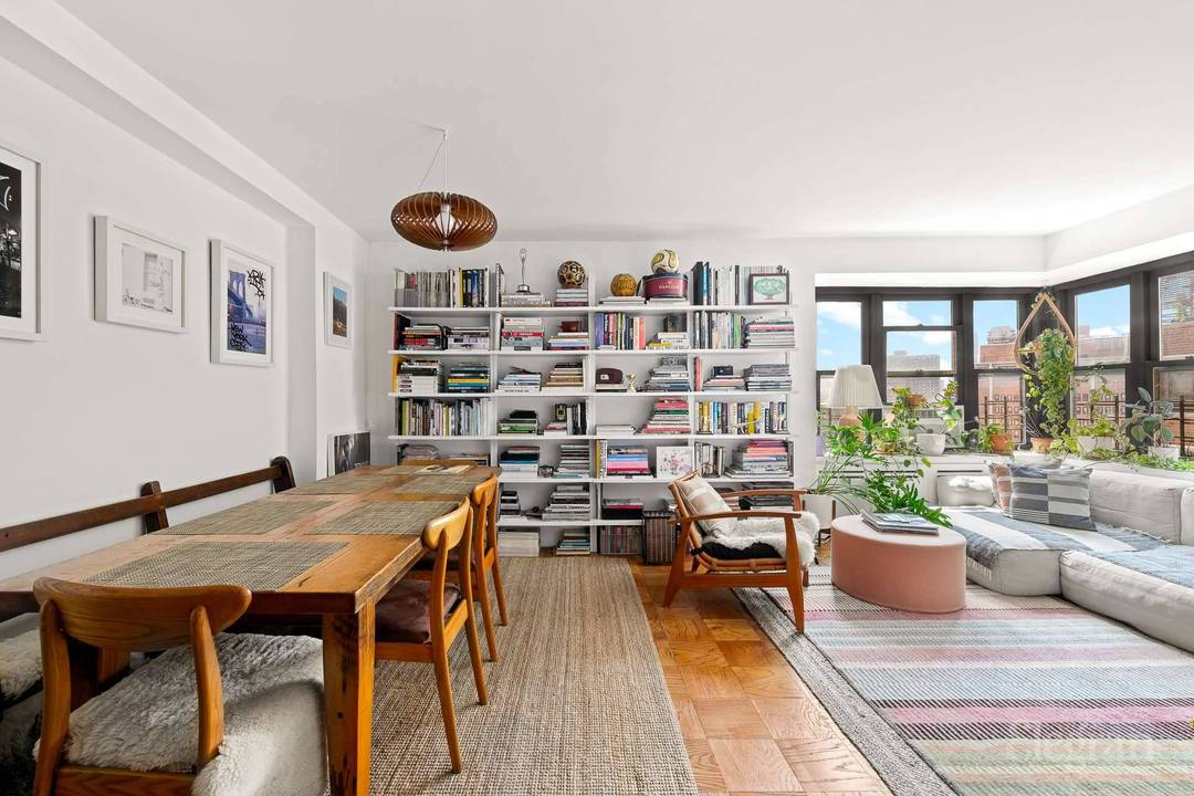 High floor 2 bedroom with southwest facing windows into the expansive living room, setting a warm and inviting tone throughout this beautifully updated home.