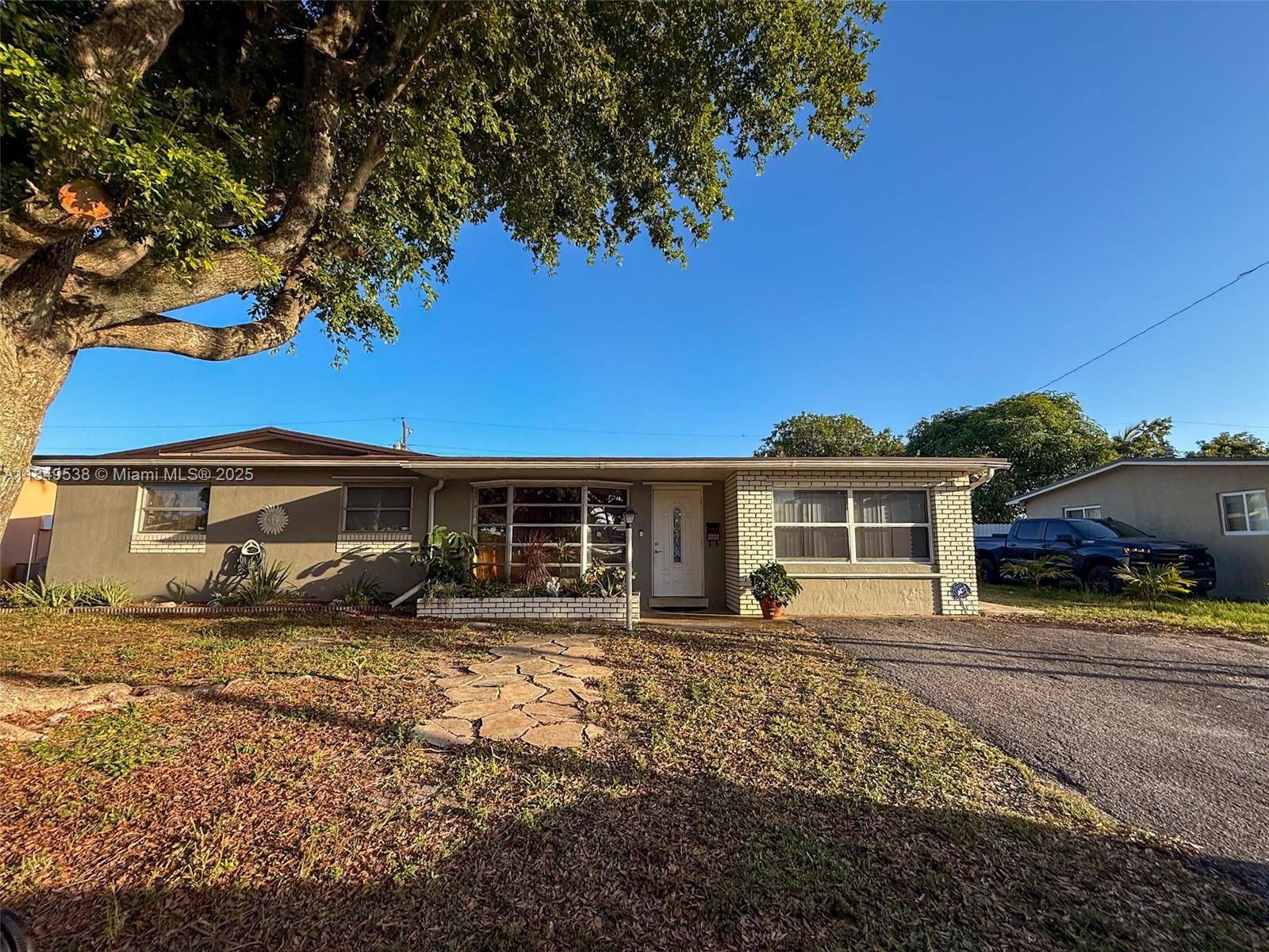 Well maintained 3 bedroom, 2 bath single family home with separate in law quarters and private entrance in Pembroke Pines.