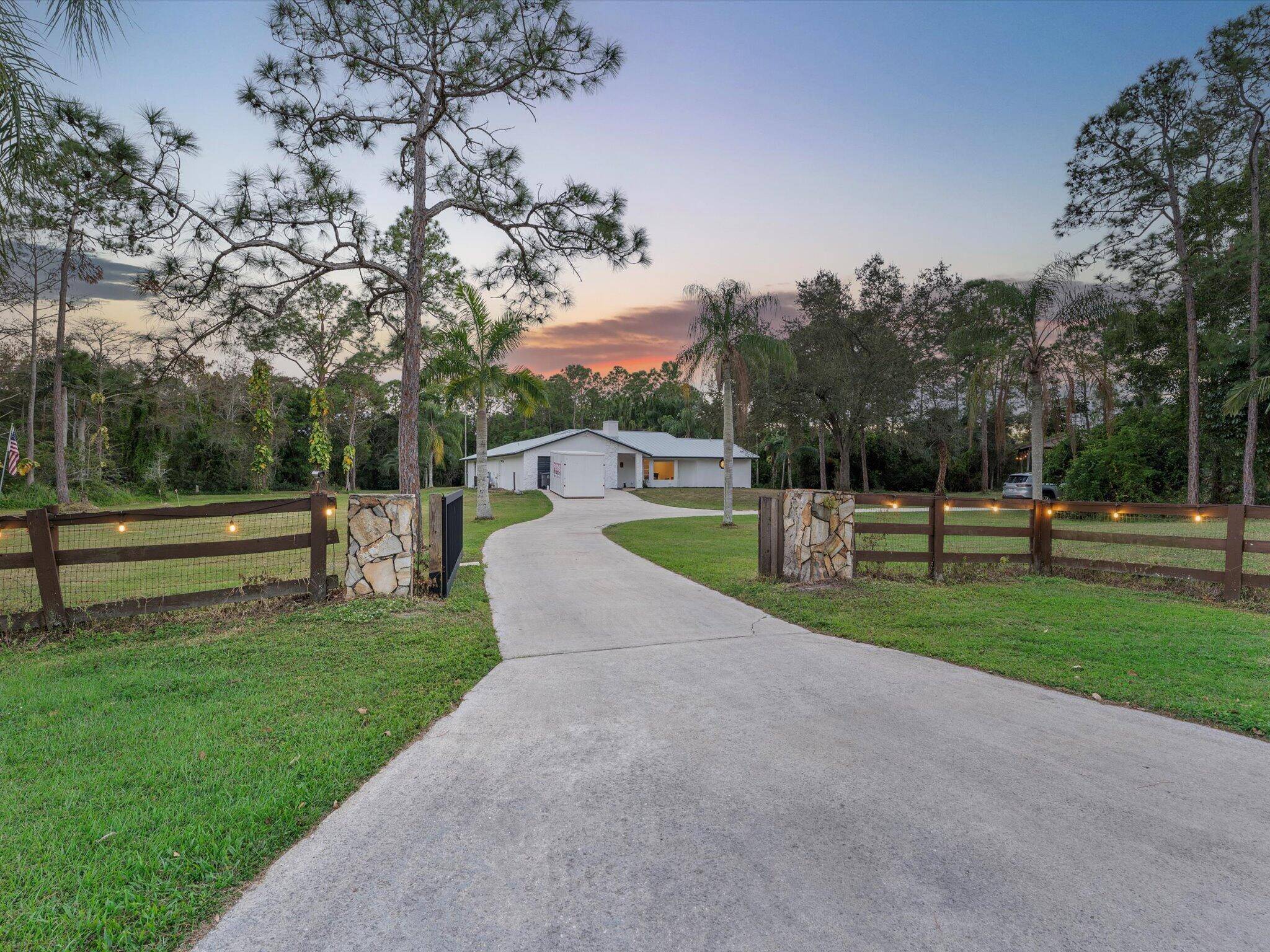 Exquisite Equestrian Estate in Palm Beach County's Prestigious Caloosa Community.