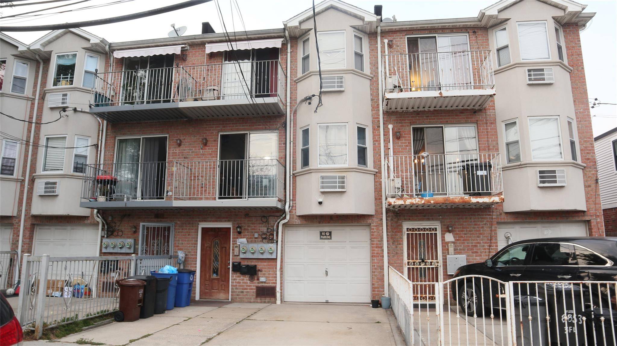 Discover exceptional income potential at this well built 2009 contemporary brick legal 3 family in Ozone Park.
