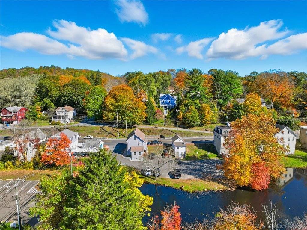 Welcome to this timeless 1907 Victorian, perched high above Crescent Street with enchanting views of Main Street and Keyboard Pond.