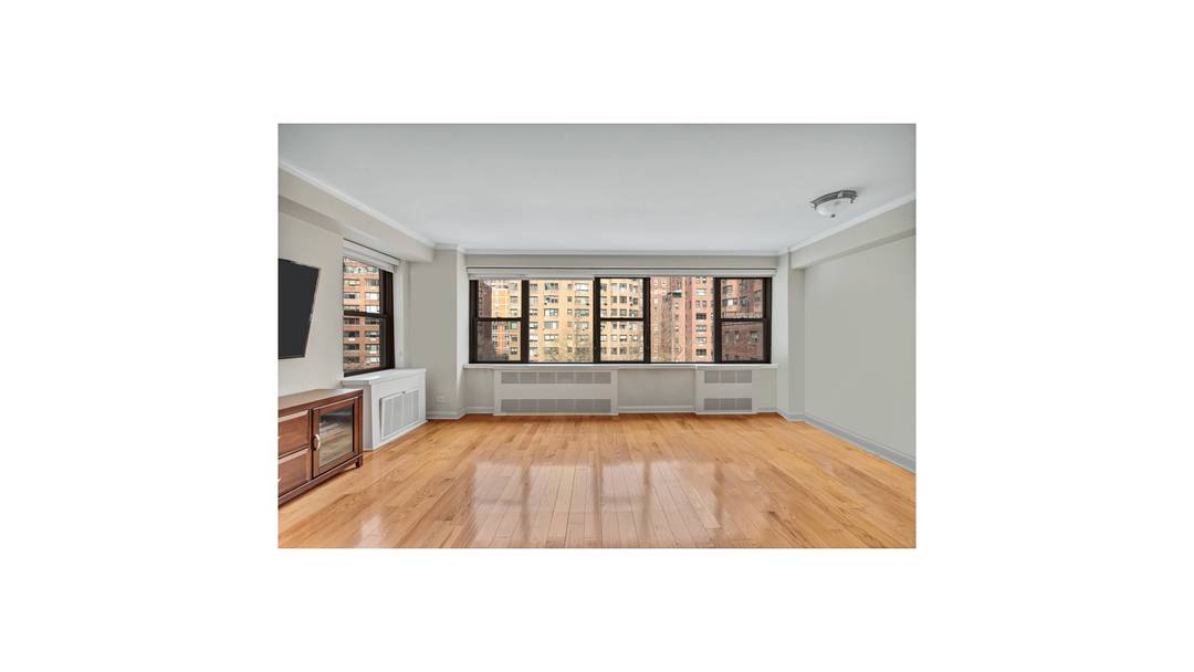 Exceptional opportunity to own a spacious and flexible one bedroom, two bath home at Sutton Gardens.