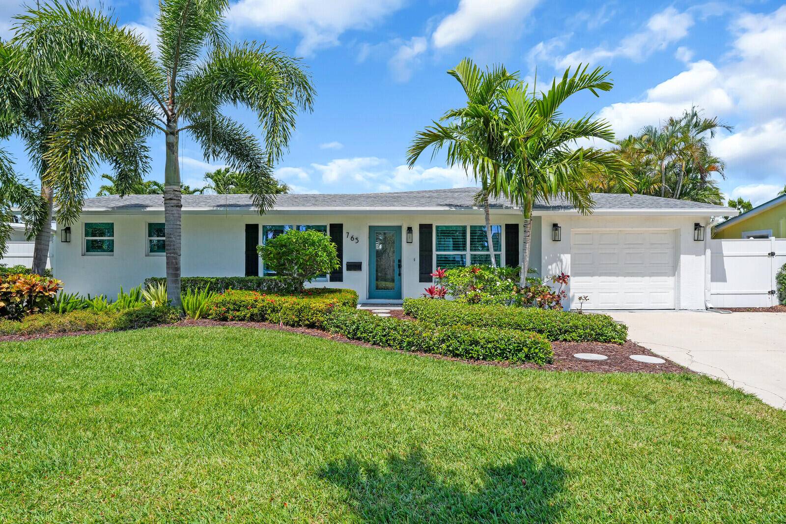 Welcome to 765 Lagoon Drive a beautifully renovated pool home in the heart of North Palm Beach, offering the perfect blend of modern upgrades and timeless charm.