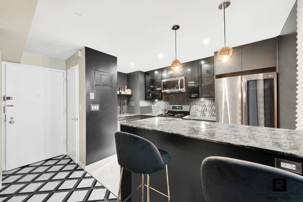 Beautifully renovated and flooded with natural light, is a stunning gut renovated modern home, unlike anything else in this luxury building !