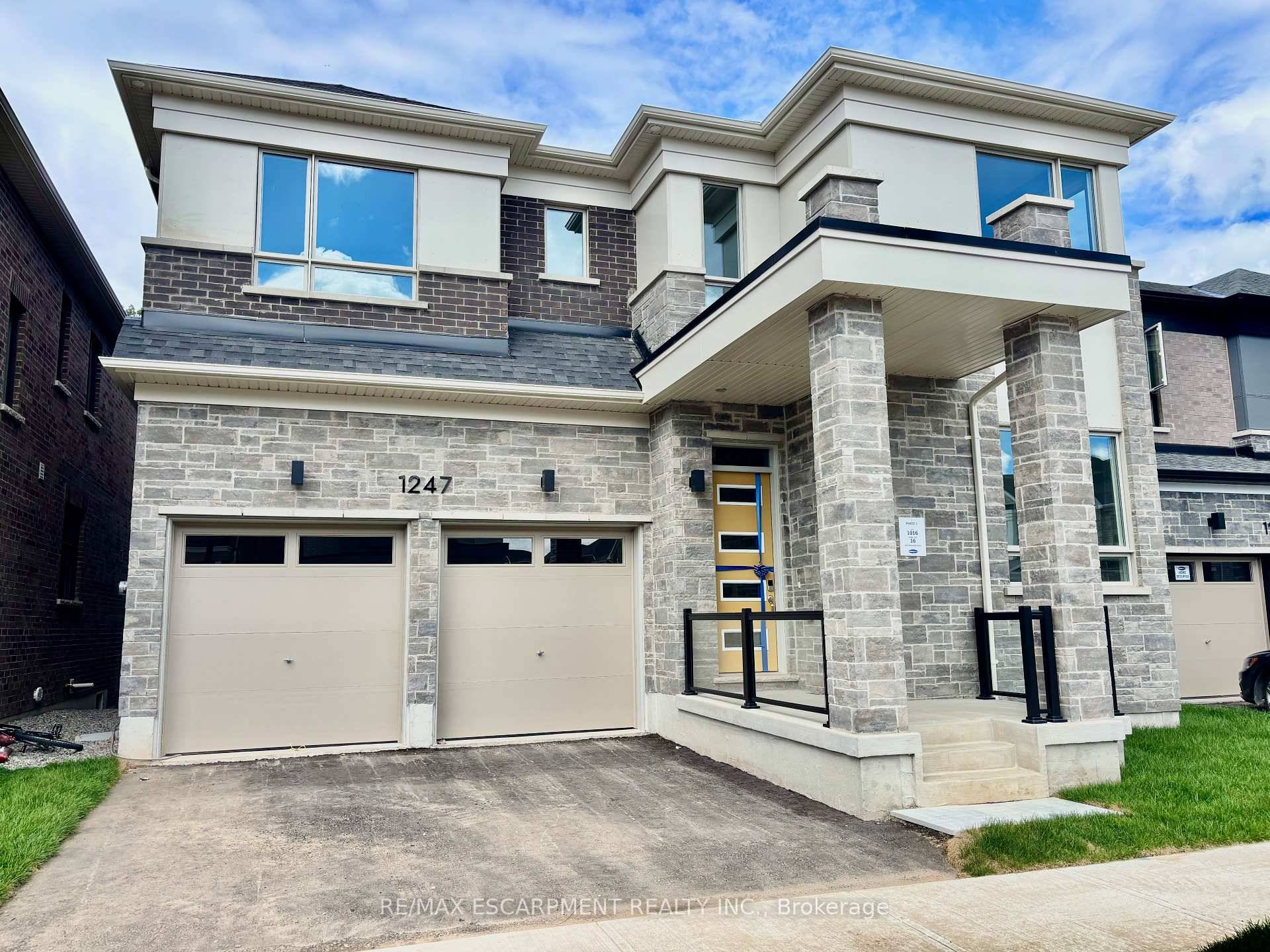Brand new 5 bedroom executive home backing onto green space in Milton's most easterly neighbourhood within a short walk from Craig Kielburger High School featuring Milton's only I.