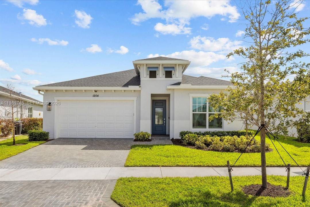 Welcome to this beautifully designed Key Largo floor plan located in the desirable Veranda Preserve 55 community in Port St.