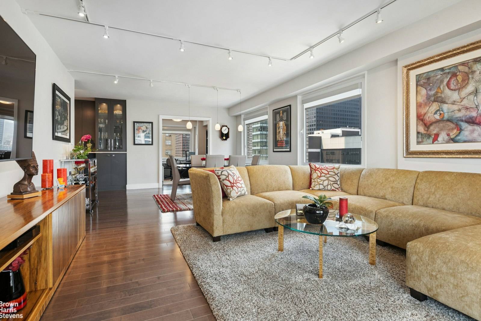Impeccably gut renovated corner apartment with a private outdoor balcony in a coveted full service co op !