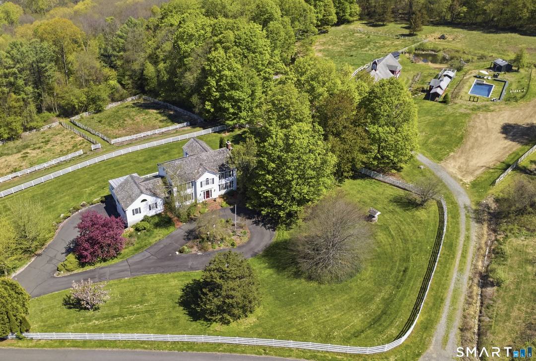 Stunning 4 bedroom colonial estate on 17 private acres in desirable Roxbury, CT.
