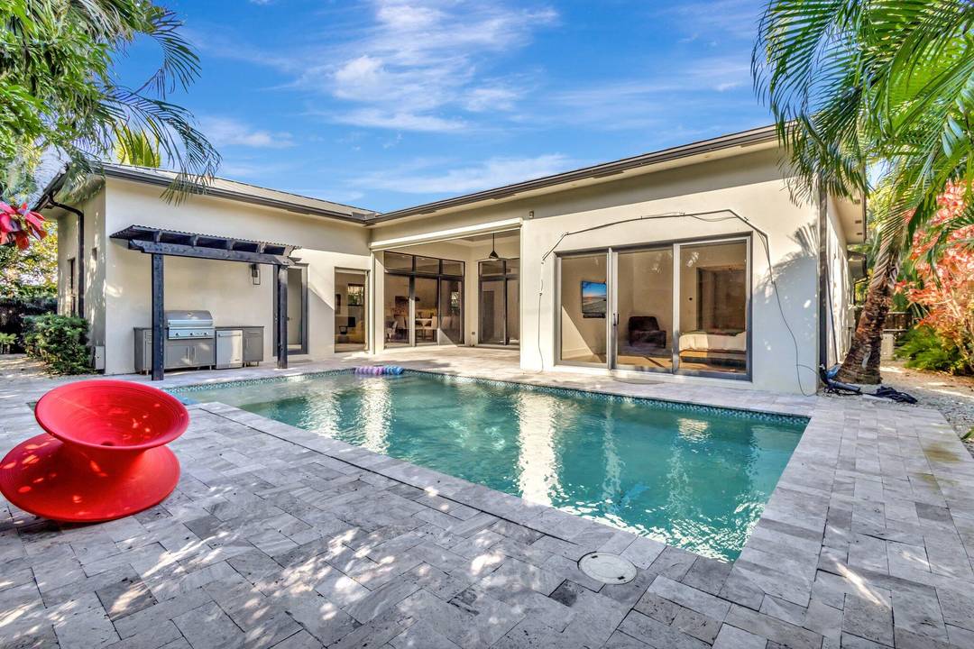 Luxurious 5 Bedroom Pool Home with Resort Style Outdoor LivingStep into refined Florida living in this stunning 5 bedroom, 4.