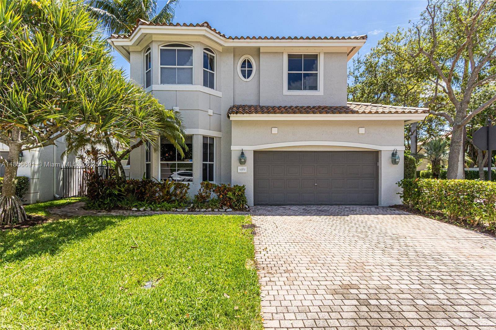 Enjoy peace of mind in this safe, gated community just minutes from the beach.