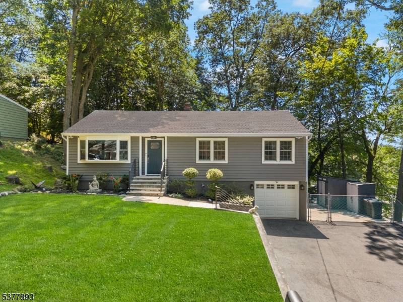Welcome home to this stunning fully updated 4 bed 2 full bath ranch in this highly sought after location nestled on a corner lot, within just minutes from the beautiful ...