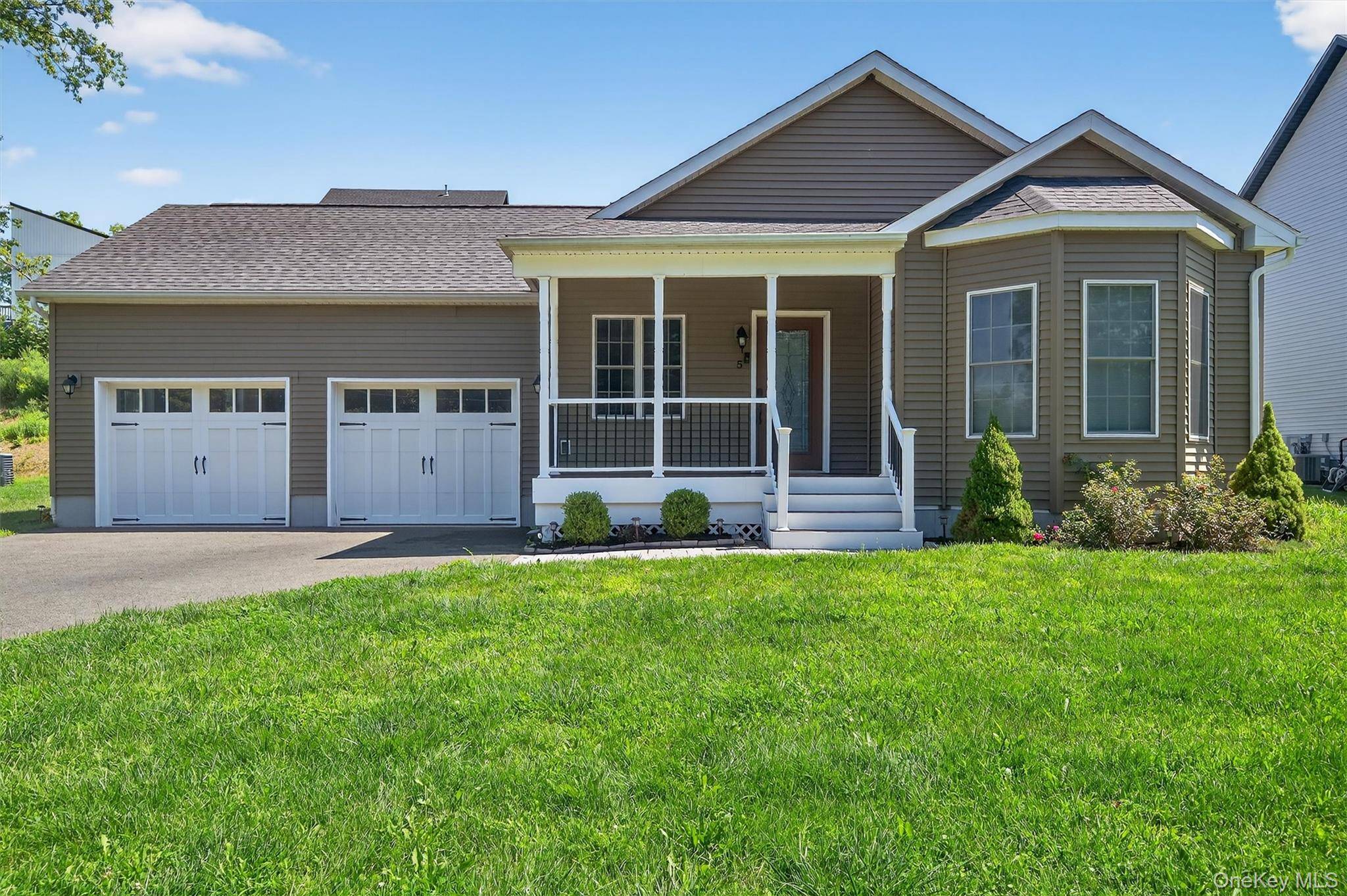 READY TO MOVE IN ! This three bedroom ranch offers the ease of one level living !