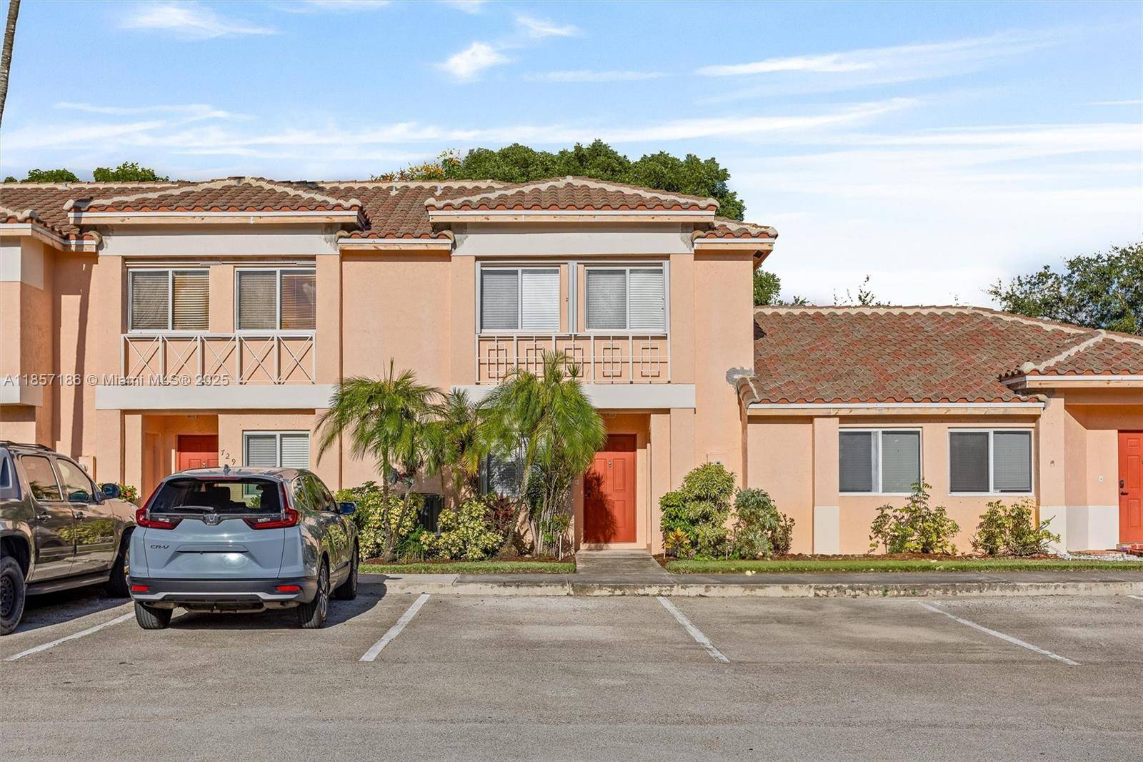 Step into comfort in this spacious townhome located in the desirable gated community of Malibu Bay in Pembroke Pines.