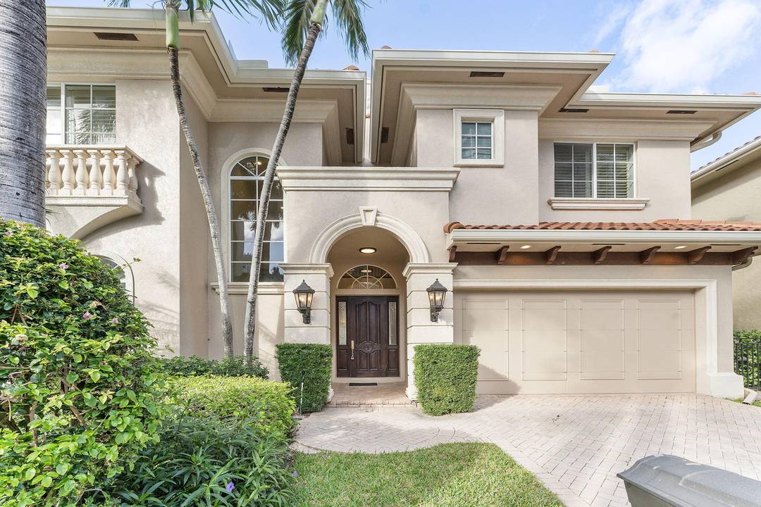 Welcome to one of Highland Beach's most exclusive and rarely available coastal enclaves a gated community of just 17 residences with private beach access only steps away.