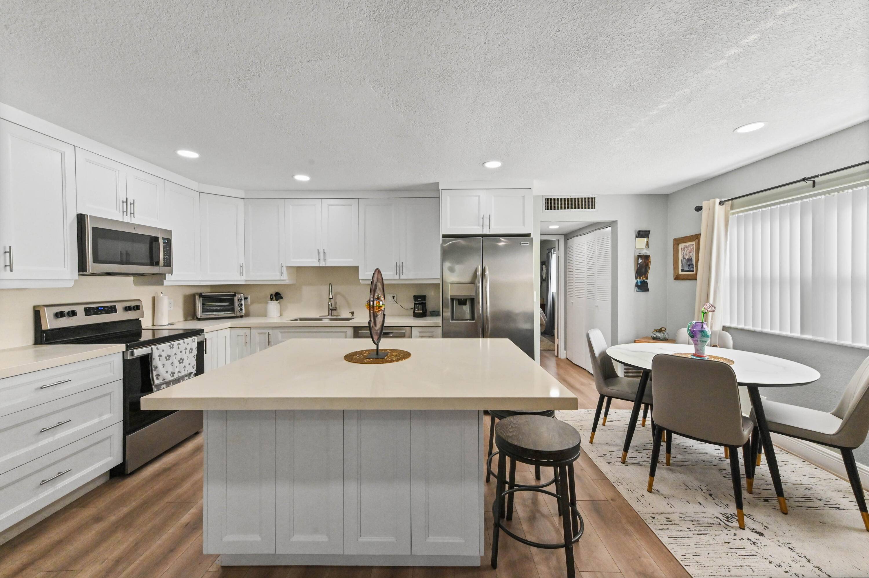 Turn key gorgeous ground floor corner condo on the golf course with the best views !
