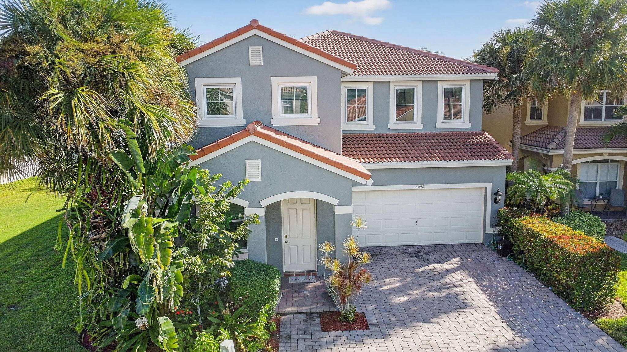 Welcome to a home that feels both timeless and rare a reimagined Tequesta model residence tucked behind the gates of Cocoplum, where architecture and comfort meet with quiet confidence.