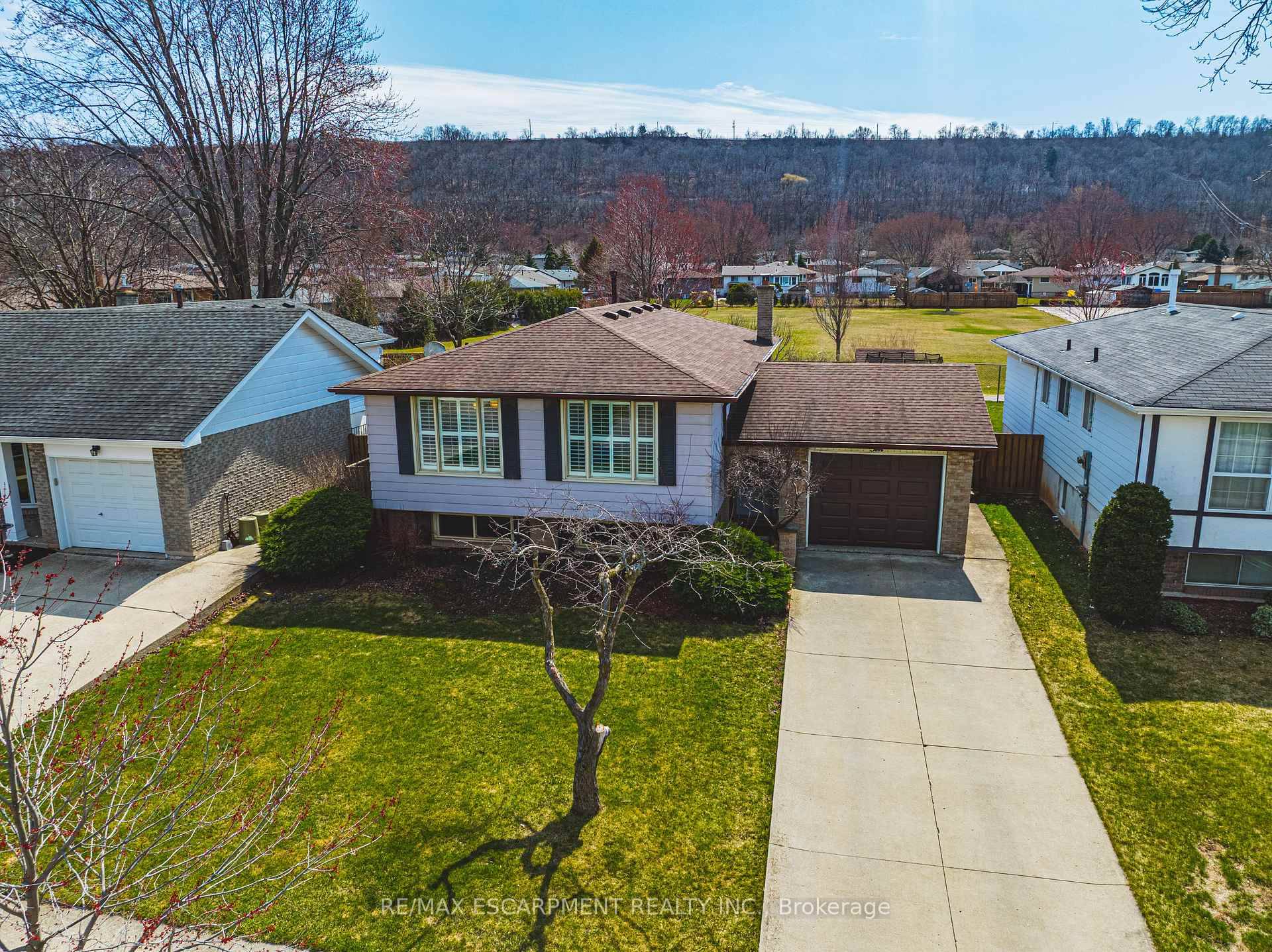 Tucked in a quiet cul de sac in beloved Stoney Creek, this 3 bedroom 2 full bath detached raised ranch is the kind of home families dream about.