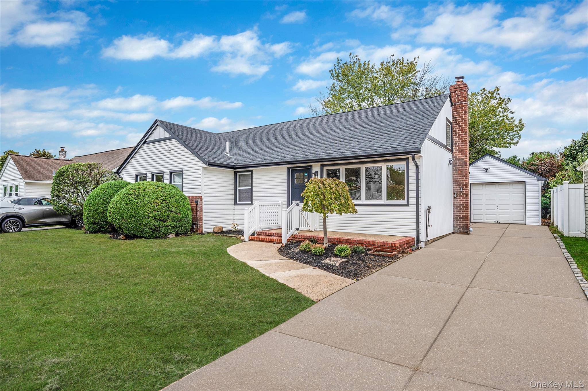 Amazing Newly Renovated Gem in Barnum Woods Section of East Meadow !