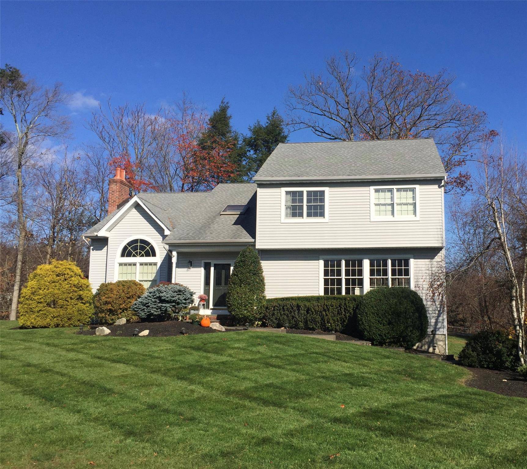 Custom built colonial nestled on a quiet cul de sac just minutes from the heart of town.