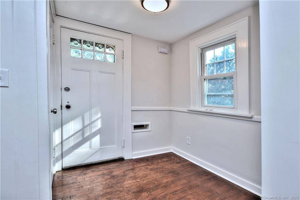 Storybook 1920's Tudor Colonial lovingly modernized while preserving its timeless character.