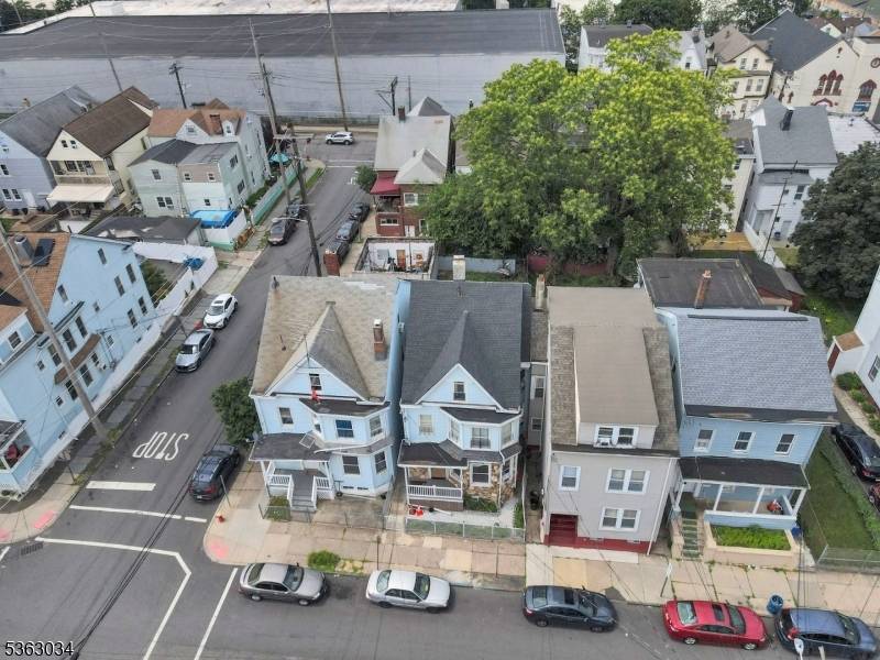Welcome to this well maintained and versatile two family home located in the heart of Paterson, NJ.