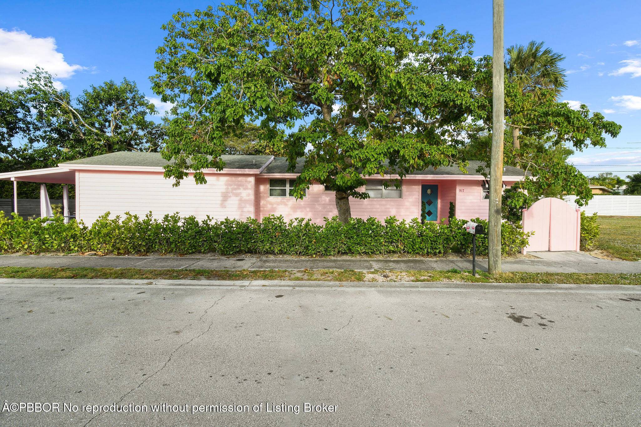 Welcome to the iconic ''Pink Flamingo House'' by designer Tracy Turco, a one of a kind 4 bedroom, 3 bath home that blends vintage charm with modern comfort.