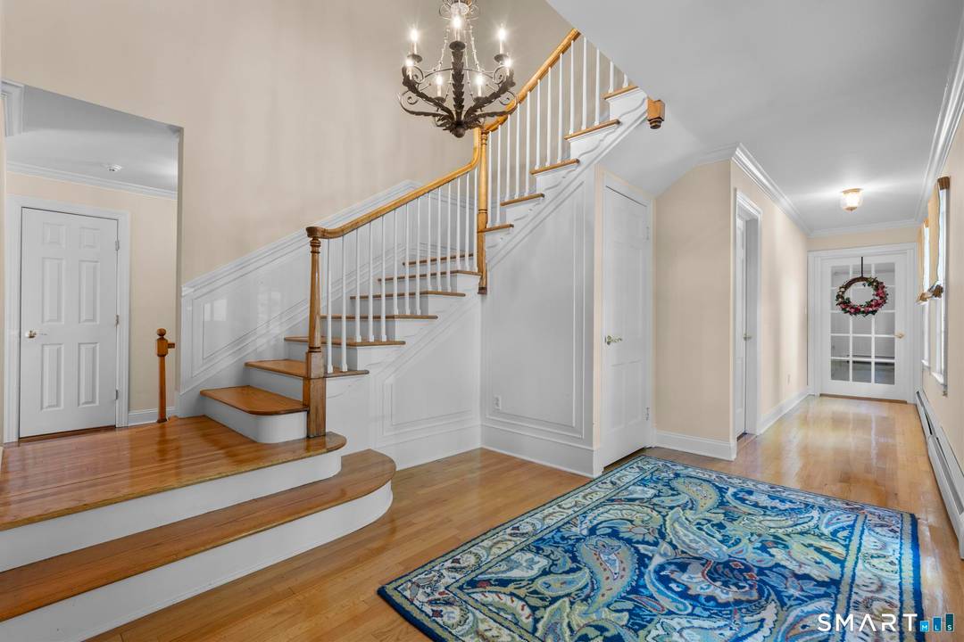 Welcome to 42 Sturbridge Hill Road, a classic Traditional Colonial tucked on a quiet cul de sac road in the highly desirable Brushy Ridge neighborhood, just minutes from New Canaan's ...