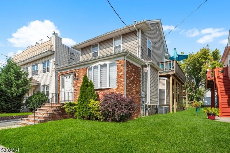 Welcome to this updated 2 family home set on a quiet residential street in desirable Linden.